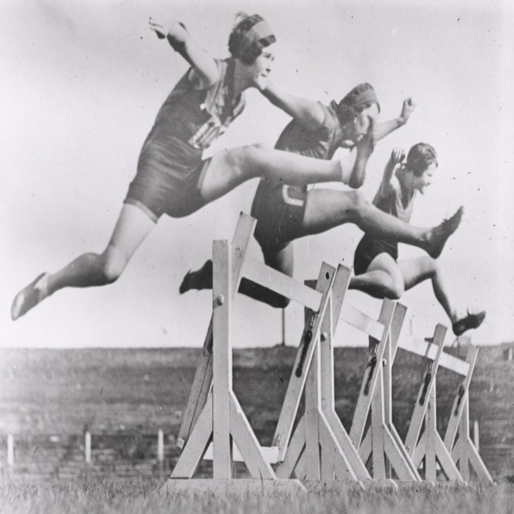 three women while hurdling